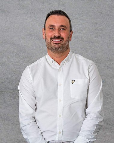Scotland client posing for corporate headshots from SSUK - Photography by Nate Cleary