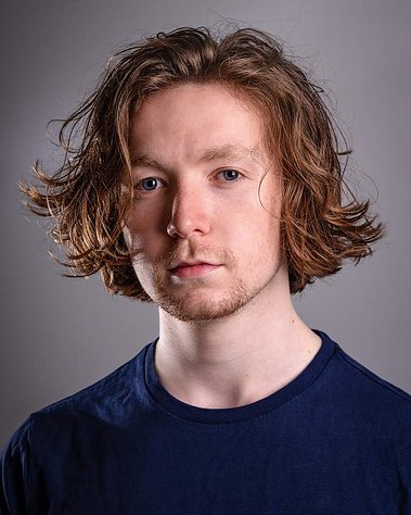 Glasgow client posing for studio headshot session - Photography by Nate Cleary