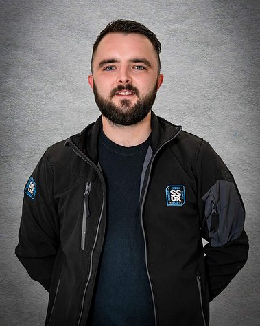 Scotland client posing for corporate headshots from SSUK - Photography by Nate Cleary