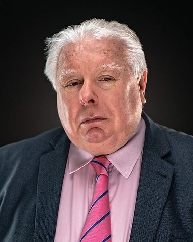 Glasgow client posing for Corporate studio headshot session - Photography by Nate Cleary