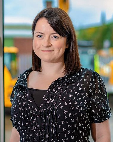 Scotland client posing for corporate headshots from Scot JCB - Photography by Nate Cleary
