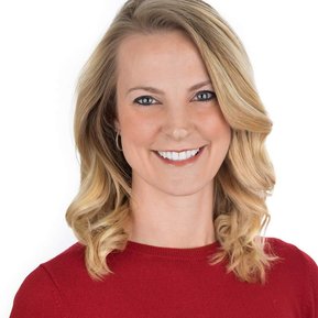 Bright and engaging headshot of a woman with blonde hair wearing a red top against a clean white background. Great for personal branding, corporate websites, and social media in Arlington Heights and Chicago.