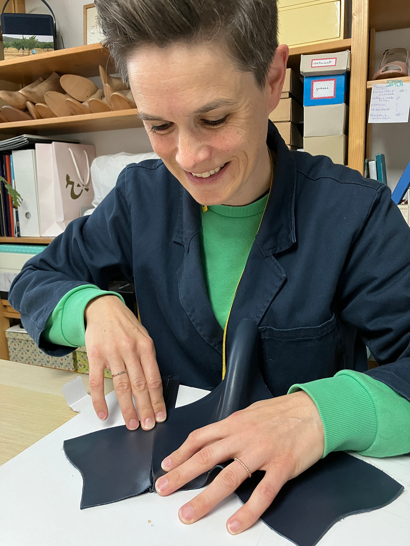Artisan shoemaker Annelieke van Halen in her studio in Delft. Creating the uppers of a pair of zipper boots. Handmade shoes, made to last