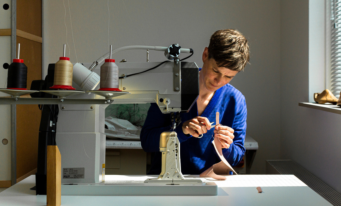 Me in my studio in Delft, working on a pair of uppers for a slingback shoe