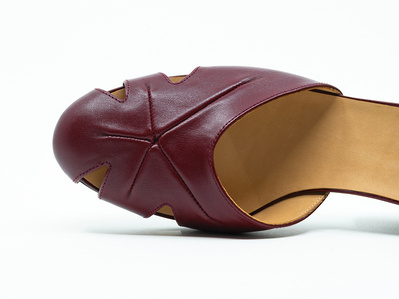 Bespoke d’orsay sandal with signature heels. Top view. The shoe is made of Italian leather. Colour red garnet. Handmade in the Netherlands by Annelieke van Halen