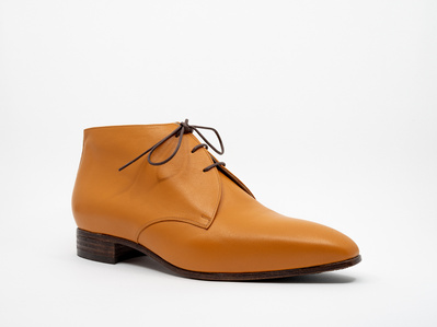 Chukka boot. Colour burnt orange. Leather soles. Handmade in the Netherlands by Annelieke van Halen. Handcrafted shoes, bespoke footwear