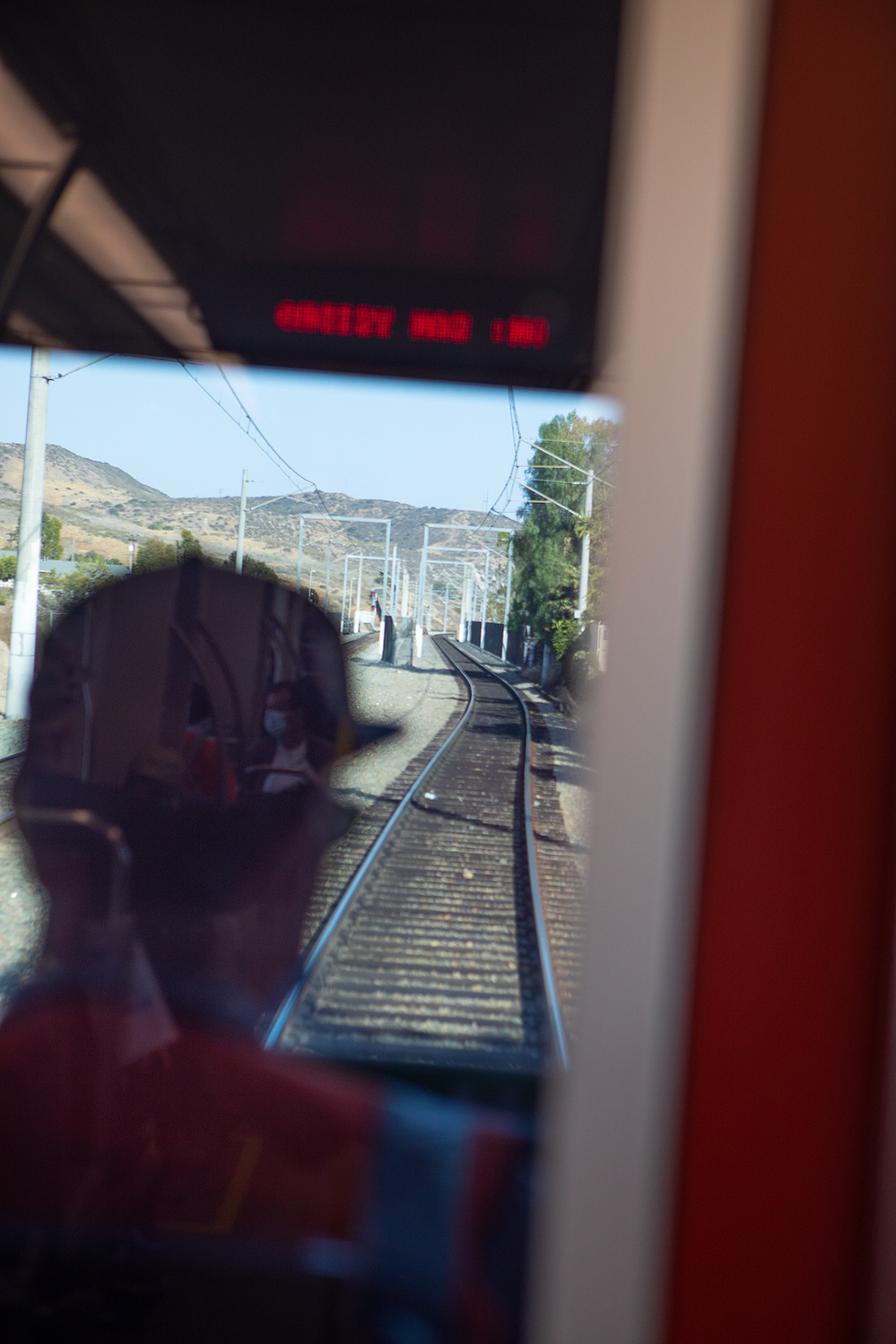 A conductor drives a Blue Line trolley toward San Ysidro, June 1, 2021.