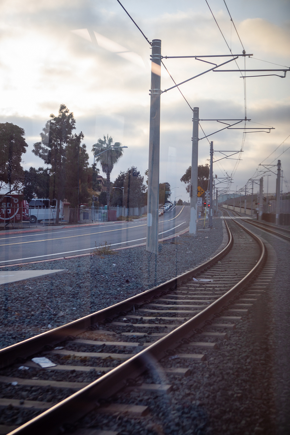 The tracks of the Blue Line are seen from inside a trolley heading toward downtown San Diego, June 1, 2021
