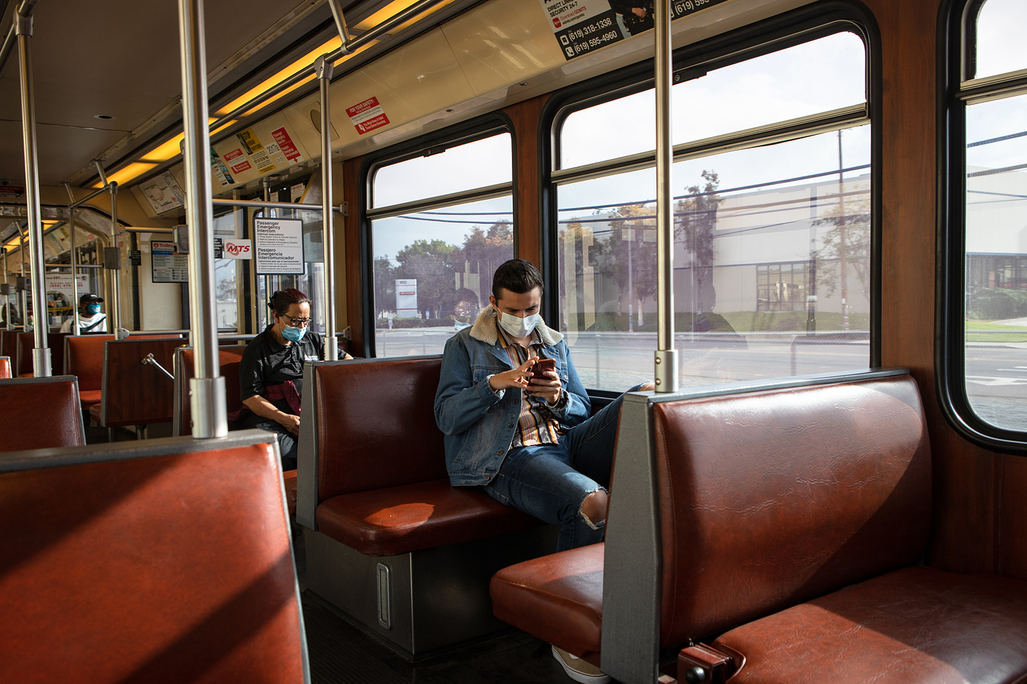 Passengers ride the Blue Line toward downtown San Diego, May 20, 2021.