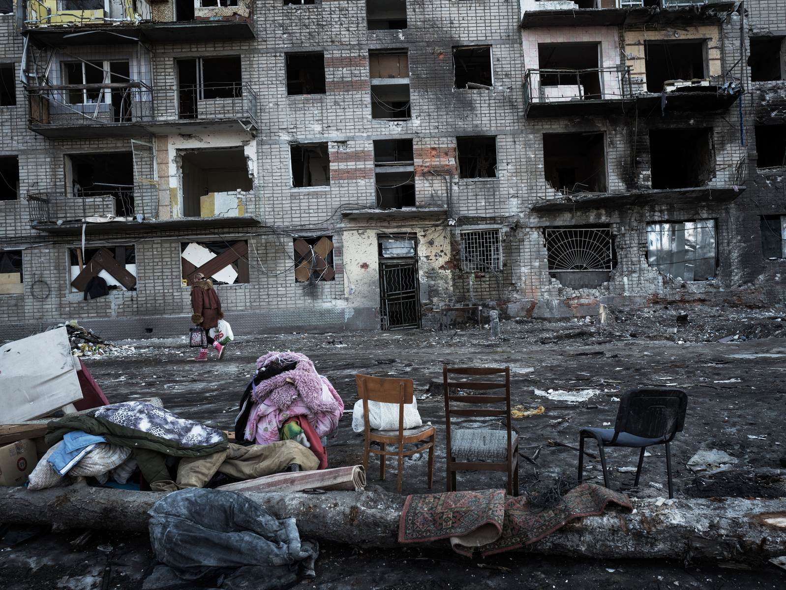 Destruction from a missile strike in a residential block in Kharkiv. Kharkiv under shelling by Russian army, Ukraine. 25 March 2022.