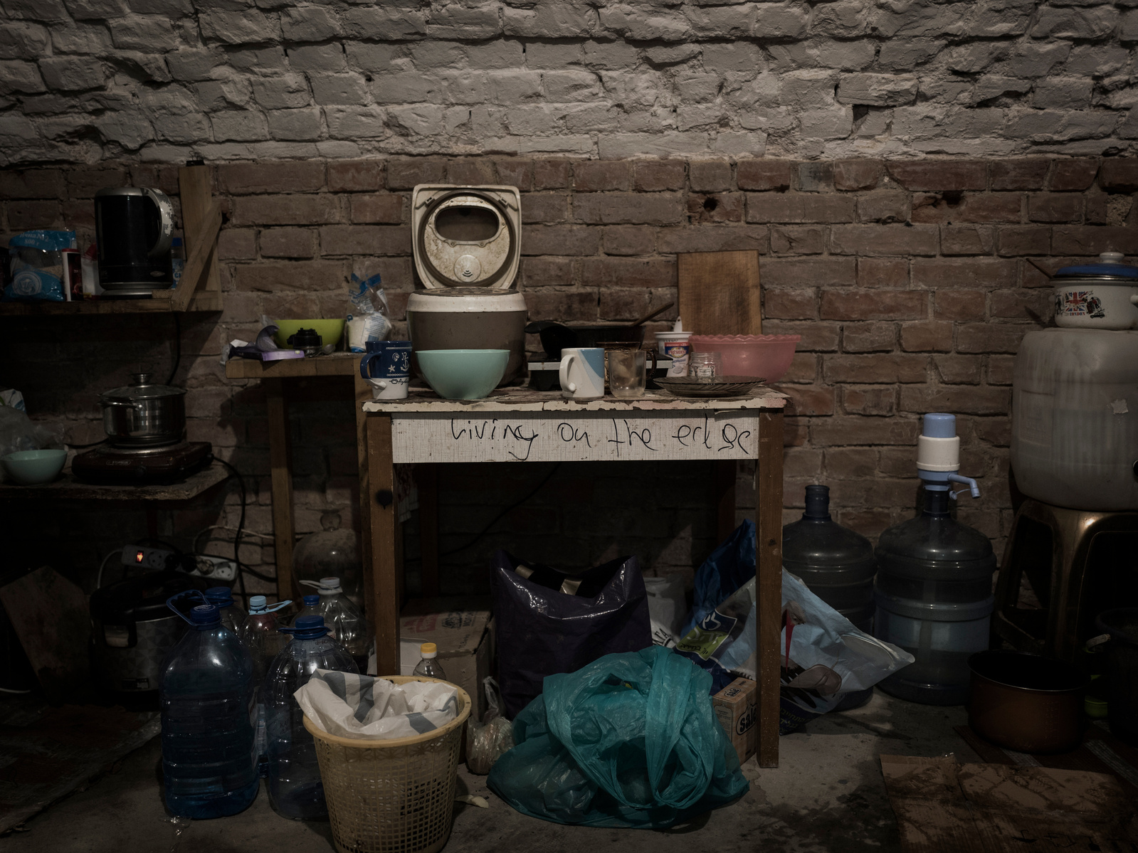 Artists meet and perform in a building basement. Kharkiv under shelling by Russian army, Ukraine. 27 March 2022.