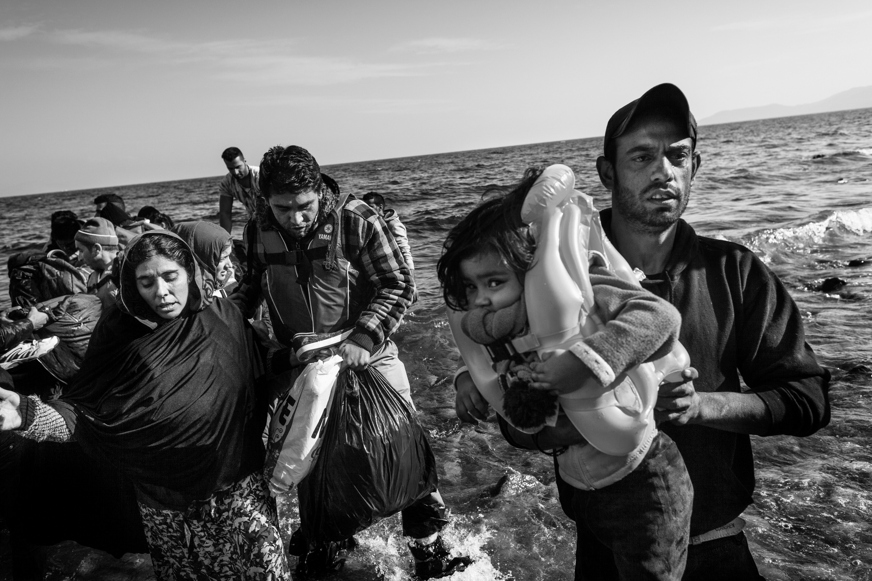 Refugees from Afghanistan and Syria arrive in boats on the shores of Lesbos near Skala Sikaminias, Greece on 08
November, 2015. Lesbos, the Greek vacation island in the Aegean Sea between Turkey and Greece, faces massive refugee flows from the Middle East