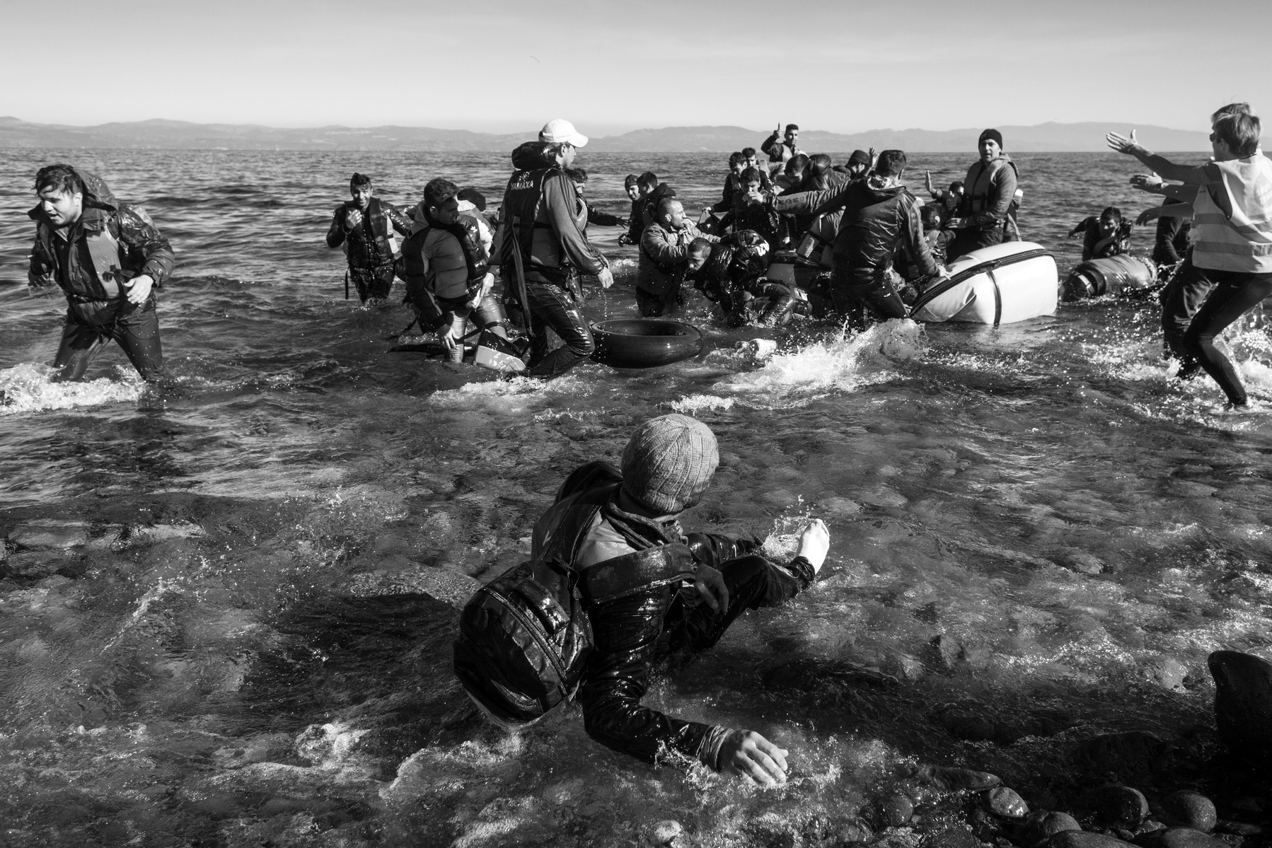 Refugees from Afghanistan and Syria arrive in boats on the shores of Lesbos near Skala Sikaminias, Greece on 03 November, 2015. Lesbos, the Greek vacation island in the Aegean Sea between Turkey and Greece, faces massive refugee flows from the Middle East