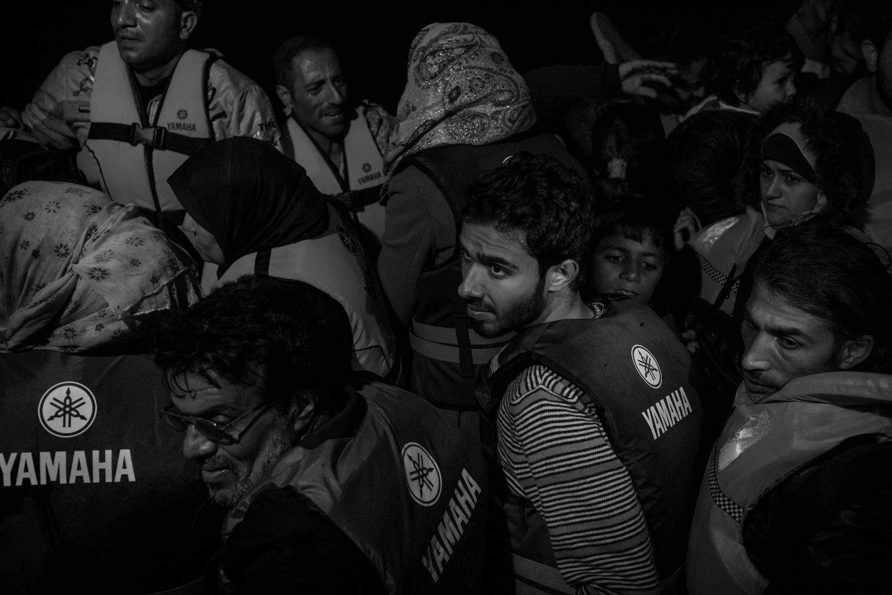 An inflatable boat overcrowded with Syrian refugees had it's engine failure during the night trip from Turkish coast, but was safely spotted and towed to Skala Sikaminias port by a Greek fishing boat, Lesbos, Greece on 12 November, 2015. At the port, ref
