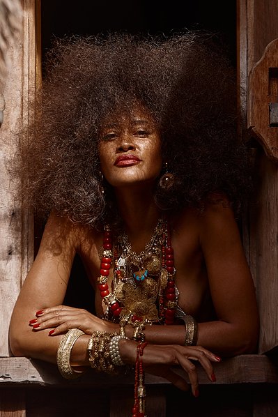 Mallence Bart-Williams with Bryan Michael Ham Photography in Bali, Indonesia. Wearing gold jewelry from the island of Sumba. Where African culture and Indonesian culture create beauty together.
