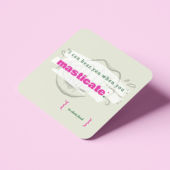 A green coaster shows a drawing of a mouth chewing food. Text overlays the drawing that says 