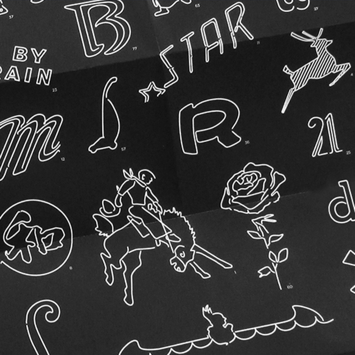 A closeup of the map and poster of Portland Oregon's best neon signs, with white neon designs of a vacuum cleaner, white stag, rose, cowboy on a horse, and letter and number designs on a black background.