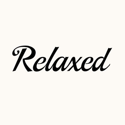 Black and white hand drawn lettering of the word "Relaxed" in black and white brush script.