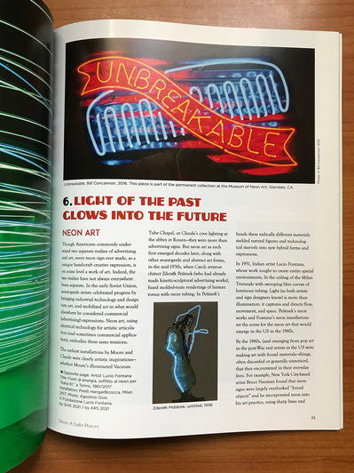 Interior page from “Neon: A Light History” featuring a blue neon comb with the word "unbreakable" over it in red (art by Bill Concannon), and with headline text using the Zaborsky typeface.