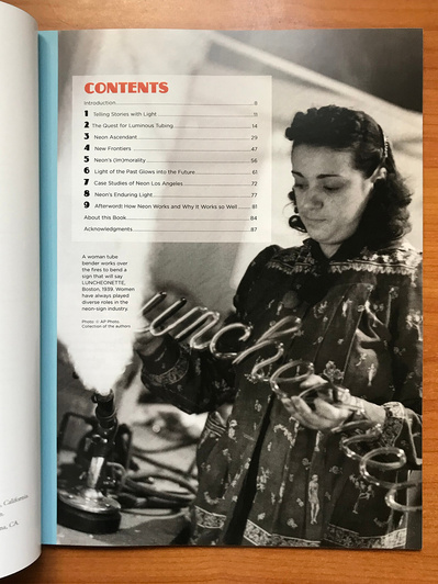 Interior page from “Neon: A Light History” featuring a vintage black and white photo of a female tube bender holding a neon word, and with headline text using the Zaborsky typeface.