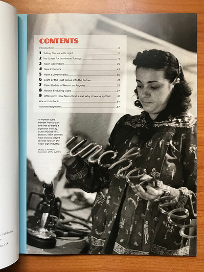 Interior page from “Neon: A Light History” featuring a vintage black and white photo of a female tube bender holding a neon word, and with headline text using the Zaborsky typeface.