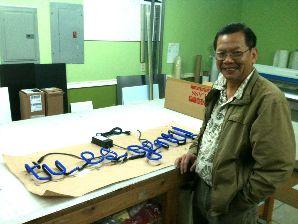 Peter Thanh Cao in his work space at Artico Lite, standing next to the 