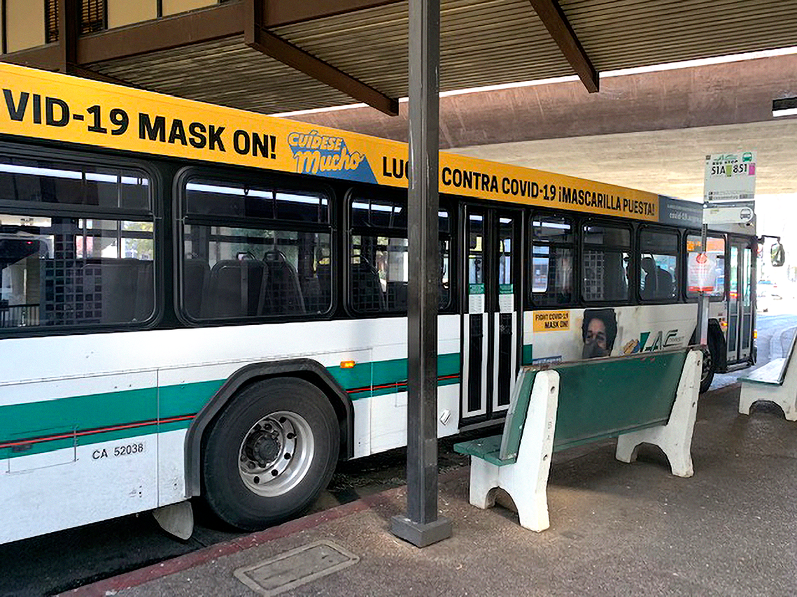 Transit bus with wrapped message for the 