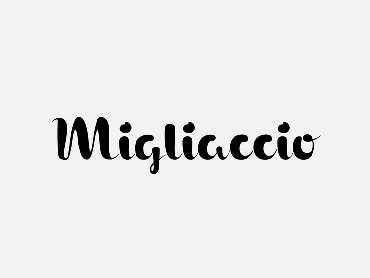 Type specimen for Migliaccio, a heavy, high-contrast brush script.