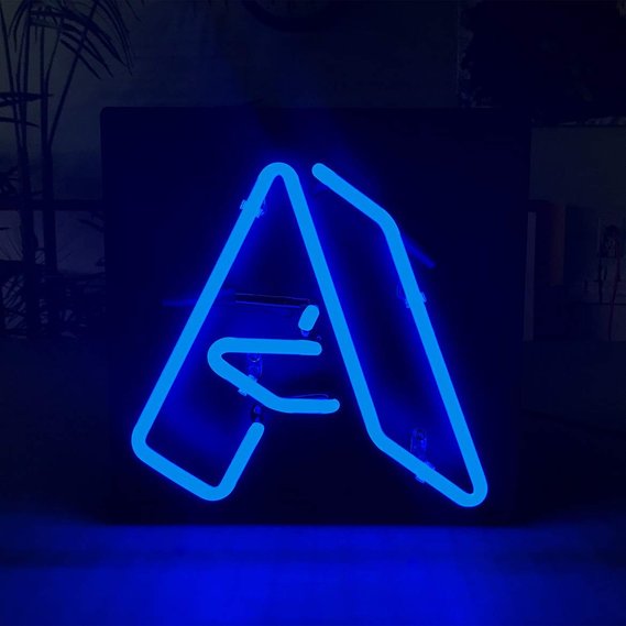 A blue neon capital letter 