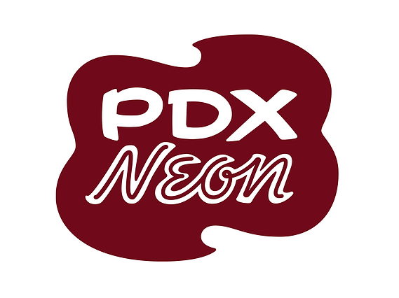 The PDX Neon logo, drawn in the style of a vintage neon motel sign, with a custom lettered mix of cowboy capitals and an optimistic 1950s script, placed within a cloud or fried-egg shape.
