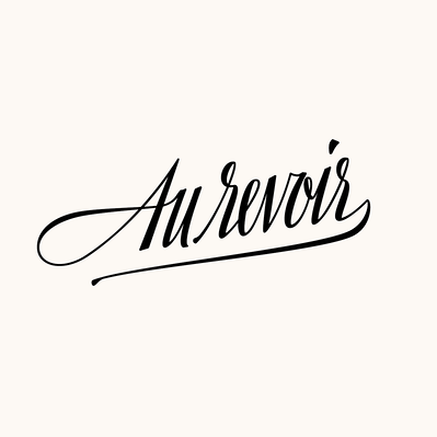 The French phrase “Au Revoir” (which means “goodbye” in English) neatly custom lettered in a compressed italic script, in the style of a calligraphy nib pen, in black ink.