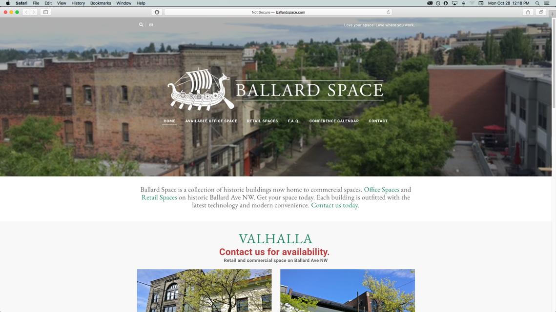 Ballard Space website home page, featuring the company's logo and a soft focus, bird's eye view photograph of Ballard's main street wtih historic brick buildings and trees.