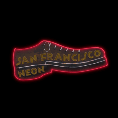 An animated neon shoe flashing in red and yellow, with lettering inside the shoe reading “San Francisco Neon.”