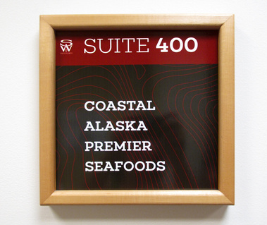 Shilshole West suite signage in the Ballard Seattle office building.