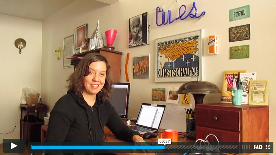 Video still from the Electric Letterland Skillshare class, with Kate Widdows sitting at her desk.