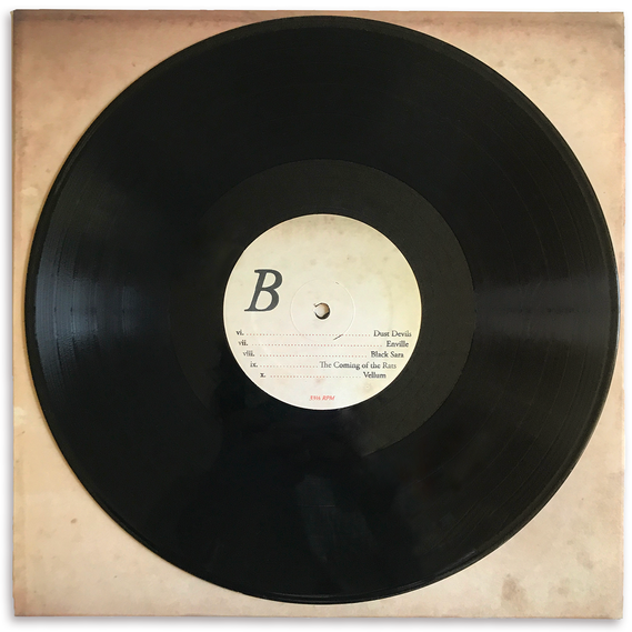 Side B of the vinyl LP of Oneiric Formulary, with a large black italic 