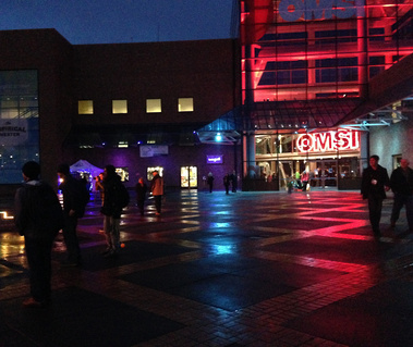 The plaza at OMSI is lit with the 