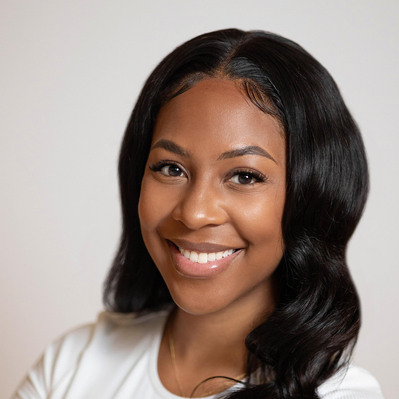 A Corporate headshot of a smiling black woman with medium length wavy black hair wearing a white t-shirt at the Astho Conference 2023 in Crystal City, Virginia.
http://www.annanproductions.com/