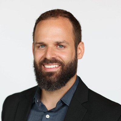 A Corporate headshot of a smiling white man with blue eyes, short brown hair, a full beard, wearing a black blazer, and gray long-sleeved shirt at the Astho Conference 2023 in Crystal City, Virginia.
http://www.annanproductions.com/