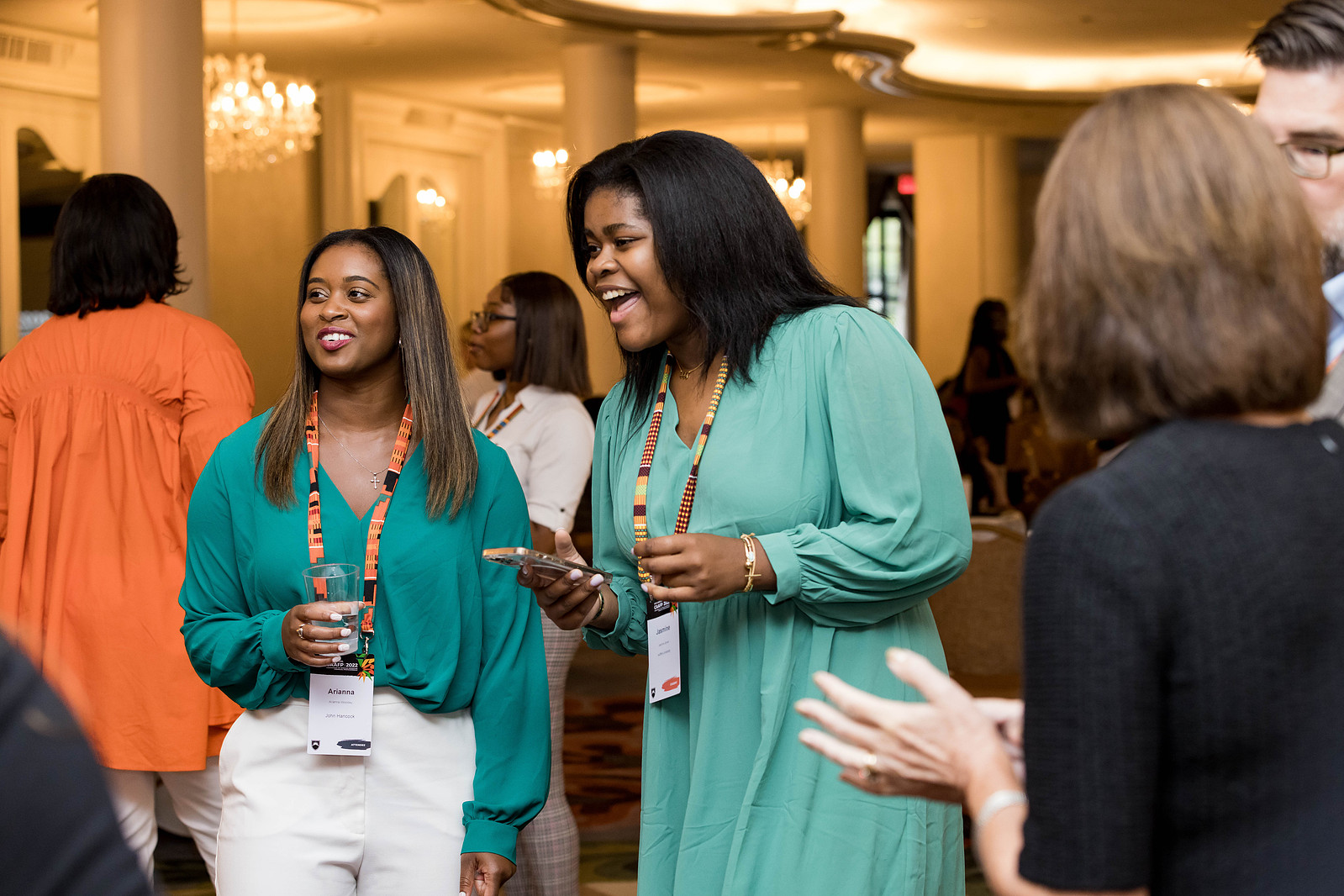 A Candid photo of two black women chatting and smiling at the 16th Annual Conference of African American Financial Professionals - CAAFP Event 2022
https://www.annanproductions.com