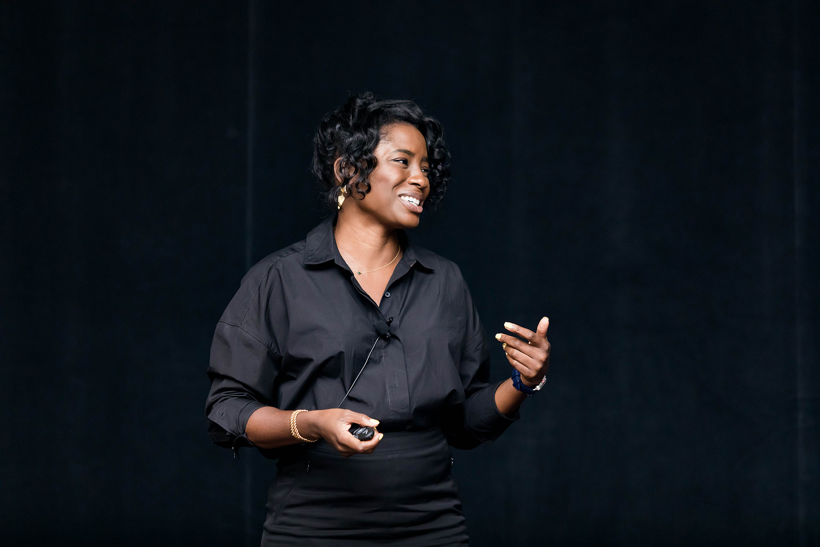 Woman speaking at the 2022 Conference of African American Financial Professionals hosted by The American College of Financial Services in Washington, D.C. www.annanproductions.com