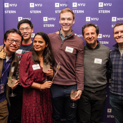 Two Asian men, One East Asian Woman, and two white men pose in a photo booth image at the 2023 NYU Event.
http://www.annanproductions.com/