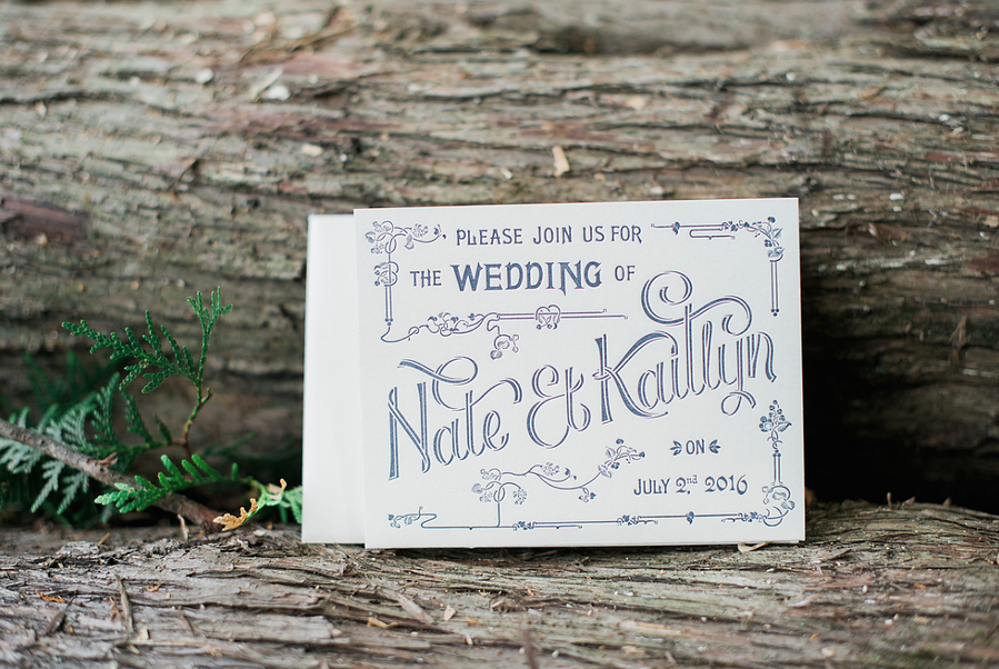 Letterpressed invitation for hand drawm type design