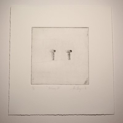 A black and white line etching of two bolts side by side, on a blank field.