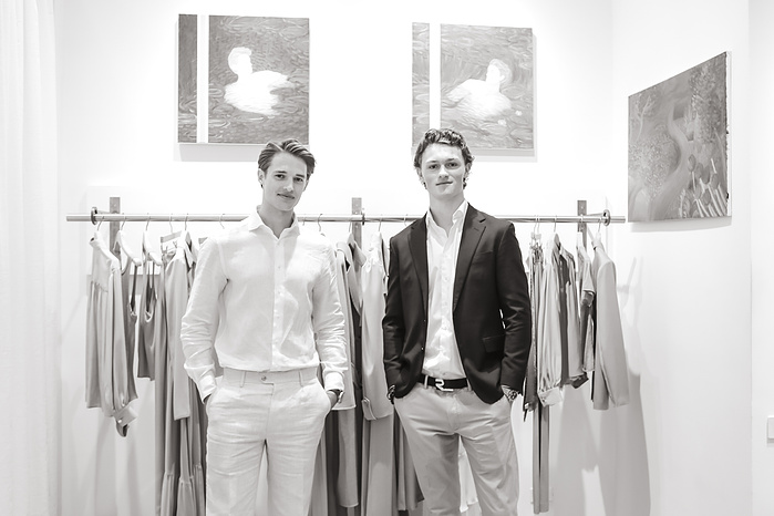 Morten Nielsen and Tobias Norstrand pictured with their portraits by Migel Girauld