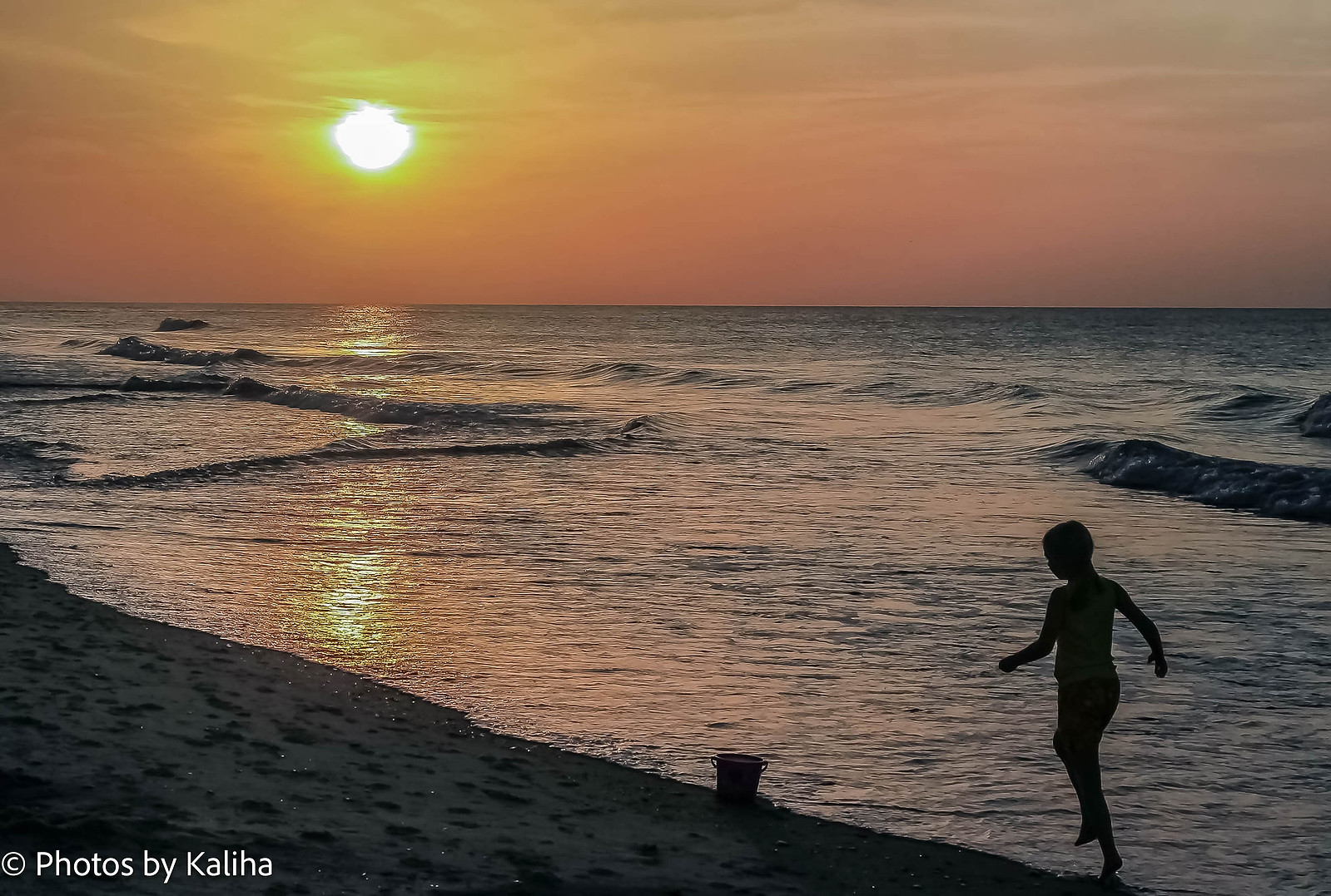 Witness the magic of a young girl collecting shells at Myrtle Beach during the morning sunrise. Embrace the joy of beach exploration in this captivating photo. #MorningSunriseShellCollecting #MyrtleBeach