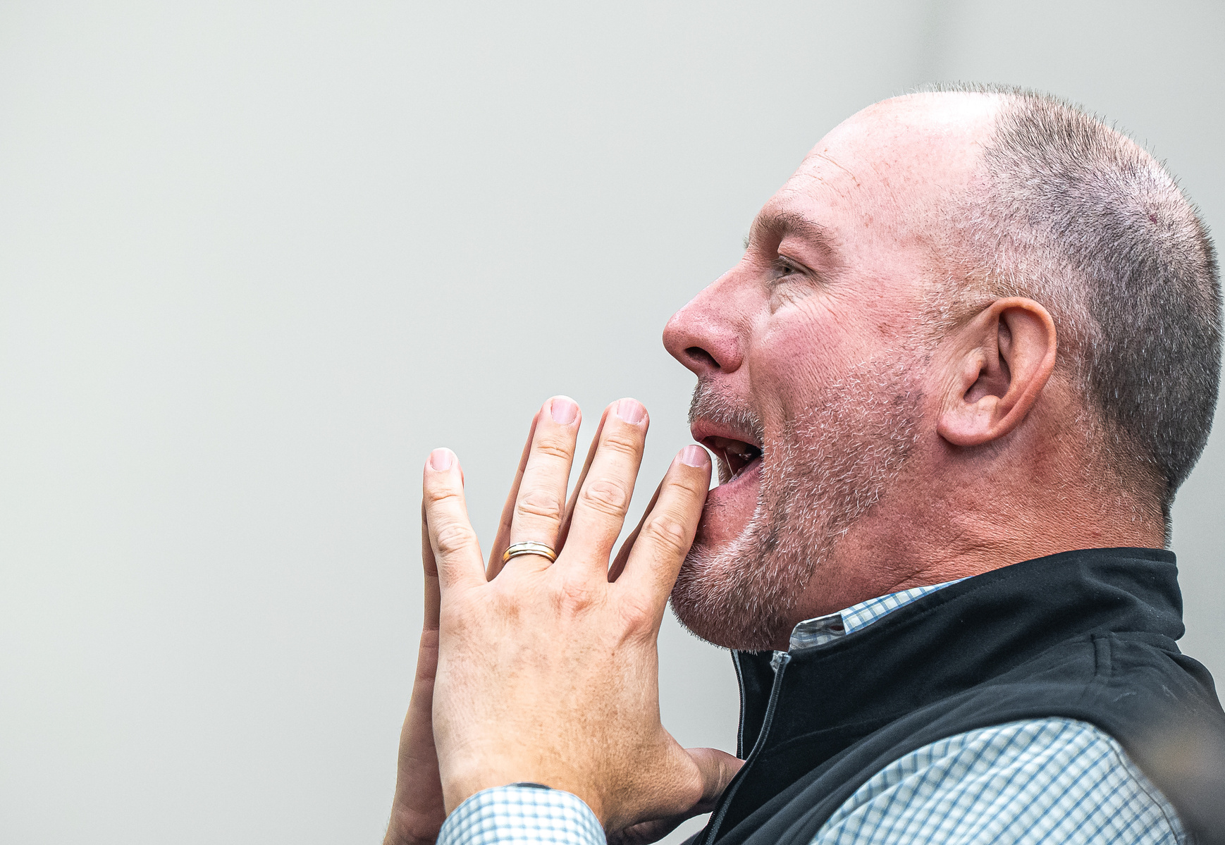 Michigan State University Trustee Mike Balow watches a debate between Michigan State University Democrats and College Republicans at Broad Business College in East Lansing, Michigan on April 15, 2025.