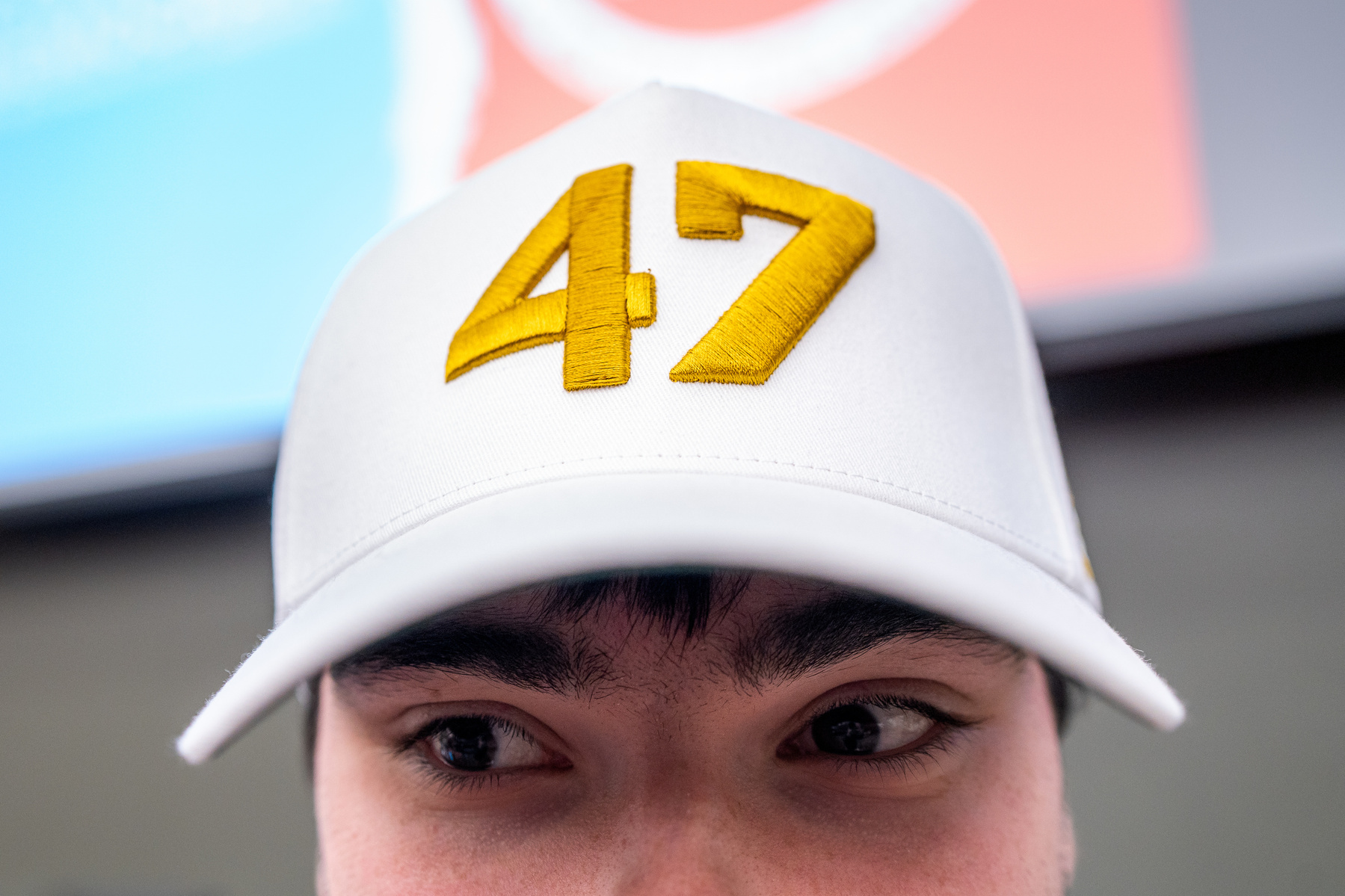 Alex Bitten, member of Turning Point USA stands for a photo prior to a debate between Michigan State University Democrats and College Republicans at Broad Business College in East Lansing, Michigan on April 15, 2025.