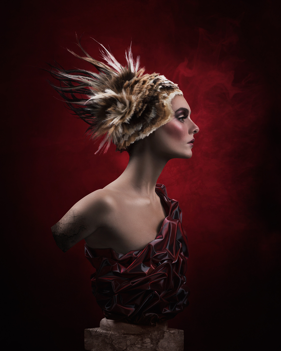 Fashion-forward model styled in Spartacus-inspired armor with creative hairstyling in a photo studio