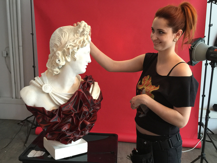 Photo of a model in Spartacus costume with creative hair, captured in a fashion-focused Montreal studio